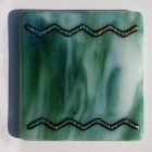 Green coaster with dichroic firestrip